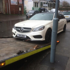 Merc estate getting loaded onto Simpsons Breakdown Recovery Birmingham